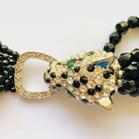 Kenneth Jay Lane Crystal Panther Torsade Necklace with Green Rhinestone Eyes and Black Glass Beads